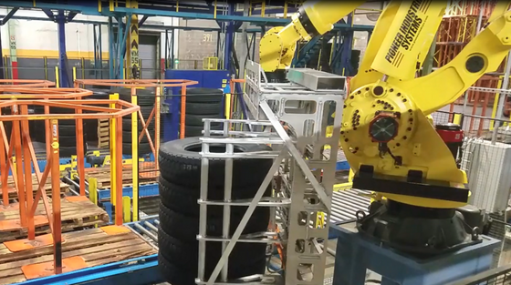 robotic tire totem material handling system