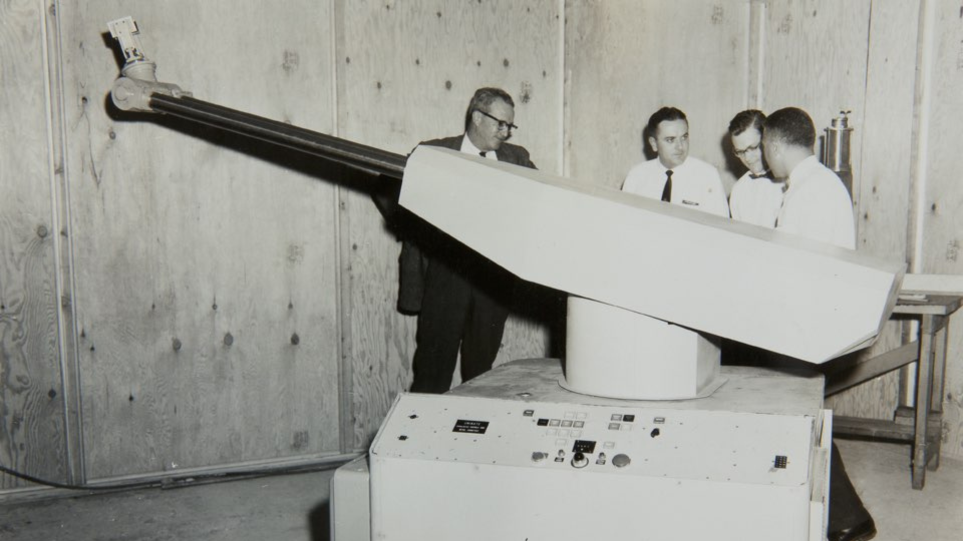 George Devol and his team with the first programmable robotic arm, the Unimate